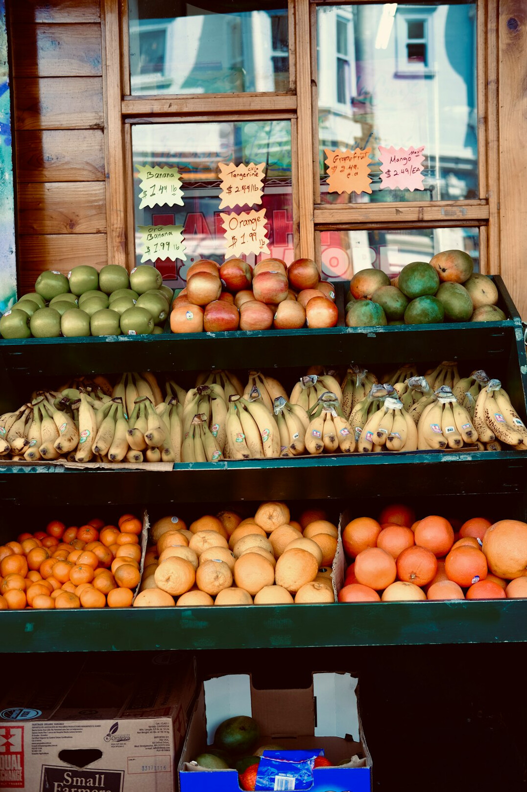 Colorful stall of fresh fruit and vegetables at a neighborhood market
