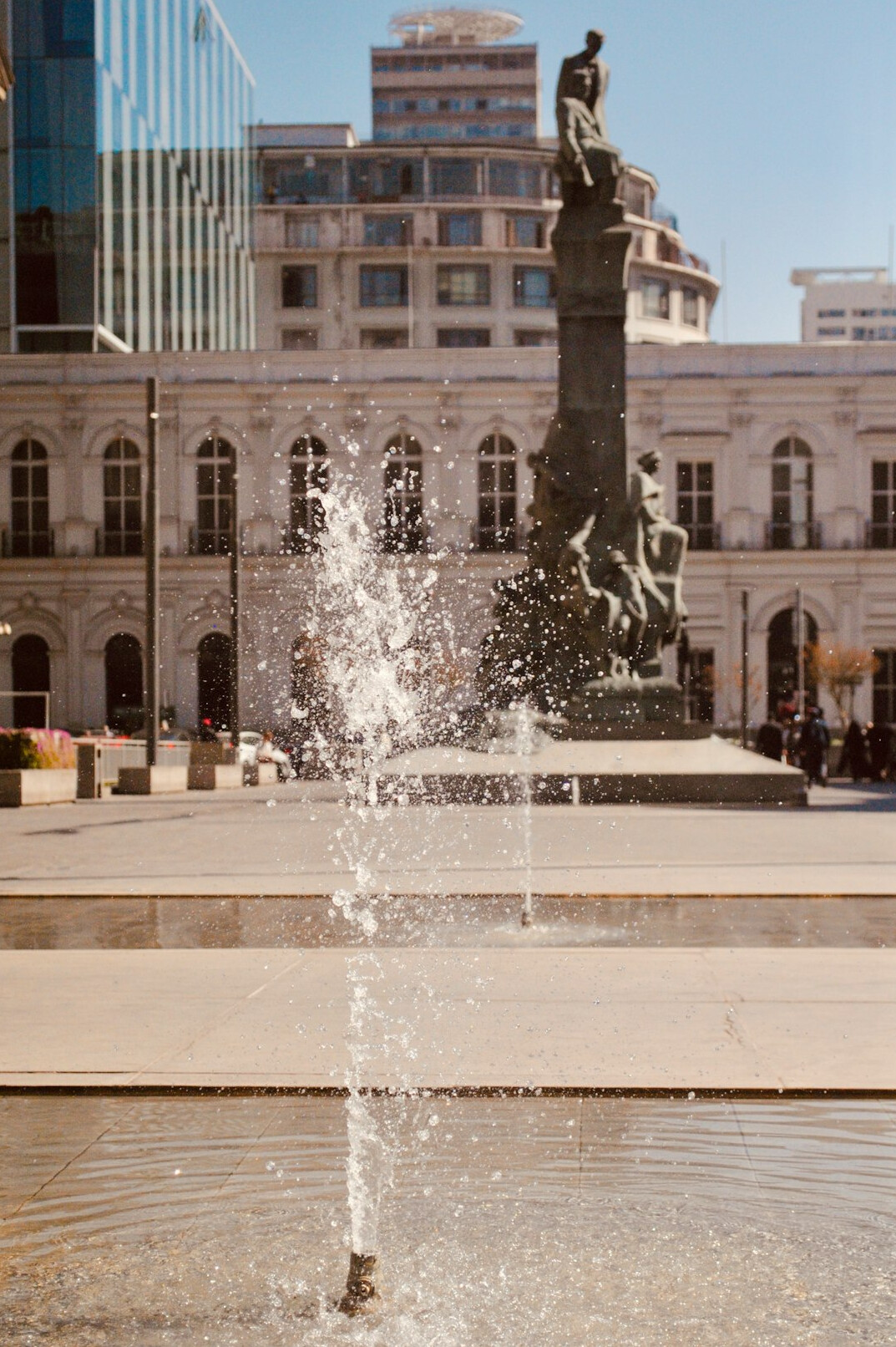 Plaza de Armas square in Santiago de Chile with colonial cathedral and palm trees